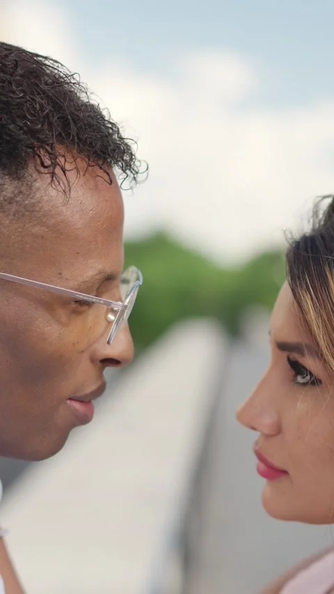 Serious couple looking to each other and start to laugh Stock Footage 239908823