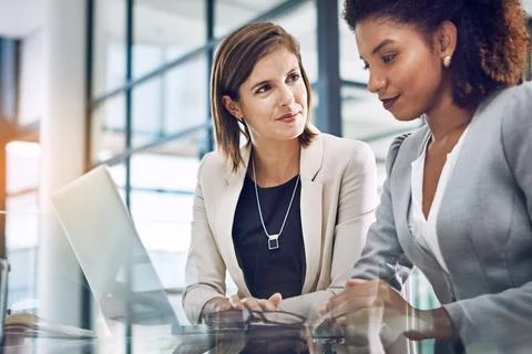 Serious, data analysis or business women with laptop for business meeting Stock Photos