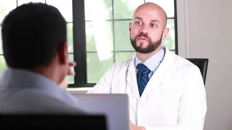 Serious discussion Dr Video stock 78135865