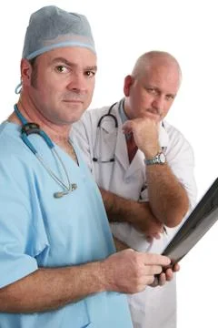 Serious Doctors With Xrays Stock Photos