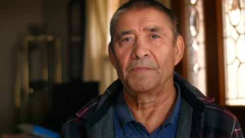 Serious elderly man portrait, looking at camera, closeup. 4K UHD. Stock Footage 101105841