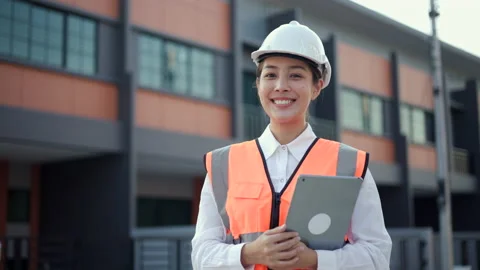 Serious engineer woman Using tablet for checking and maintenance to inspection. Stock Footage 224637725
