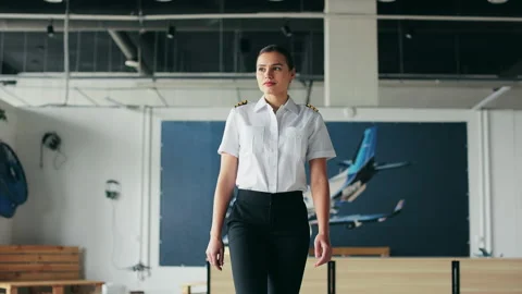 Serious female instructor, pilot teaching aviation. Stock Footage 234389717
