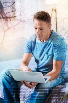 Serious freelancer doing important task Stock Photos