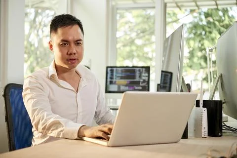 Serious Frowning Software Developer Stock Photos