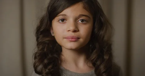 Serious girl looking at the camera Stock Footage 104103437