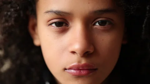 Serious Girl staring at camera. Hispanic... | Stock Video | Pond5