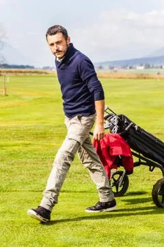 Serious golf player Stock Photos