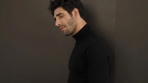 Serious guy in black Stock Footage 89560478