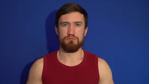 Serious guy with glasses from the sun Vidéo 124461836