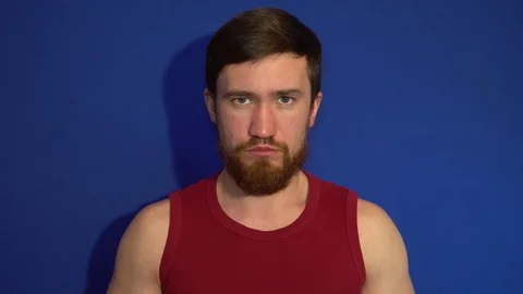 Serious guy with glasses from the sun Stock Footage 124462453