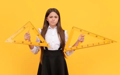 Serious kid study math. angle degree measurement. trigonometry stationery. Stock Photos