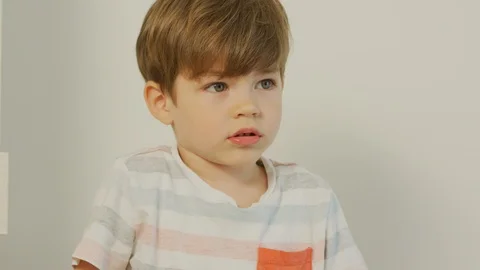 Serious little boy Stock Footage 99999942
