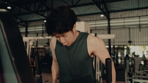 Serious-Looking Young Man Does Push-Ups for Strength at Gym, Muscular Young M Stock Footage 248848232