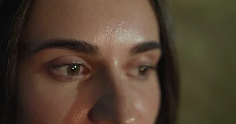 Serious macro look at camera of attractive woman Stock Footage 126968123