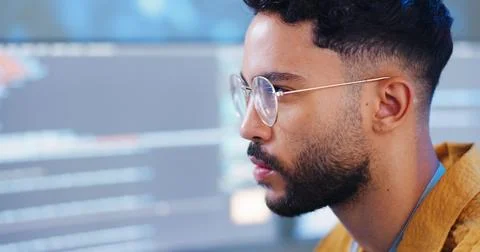 Serious, man and coding with computer for cybersecurity, developer update and Stock Photos