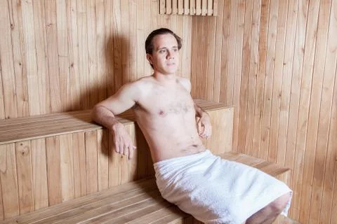 Serious man inside the Sauna Stock Photos