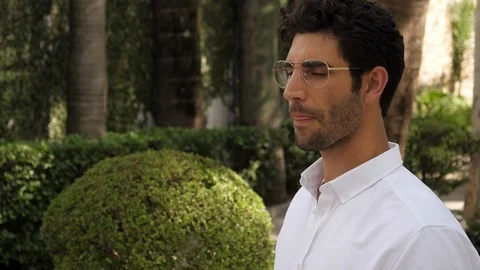 Serious man looking around Stock Footage 89560437