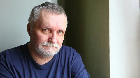 Serious man looking at the camera, front view, indoors with copy space Stock-Footage 63490807