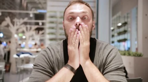 Serious man looking in camera. Funny man making silly face. Smiling man with a Stock Footage 67948096