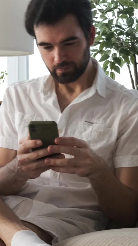 Serious Man Messaging Online At Home Stock Footage 310451253