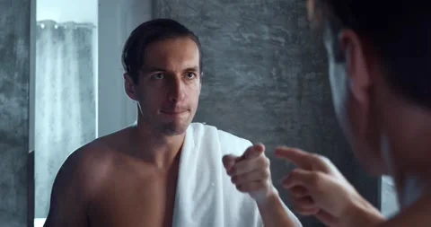 Serious man motivate himself to pull himself together before difficult day Stock Footage 231741487