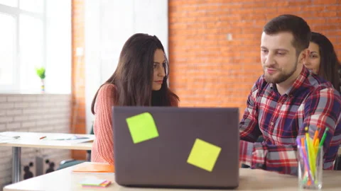 Serious man working at the computer. finds a suitable option on the Internet and Stock Footage 86647508
