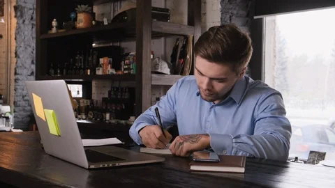 Serious man working on laptop. working hard, career ladder, making money. Stock Footage 104133522