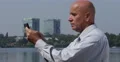 Serious Manager Outside Office Building Accessing Tablet Internet Connection 4k or 4k+ Resolution