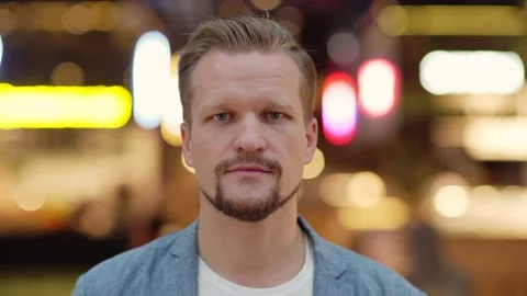 Serious middle aged man looking at camera Stock Footage 142478682