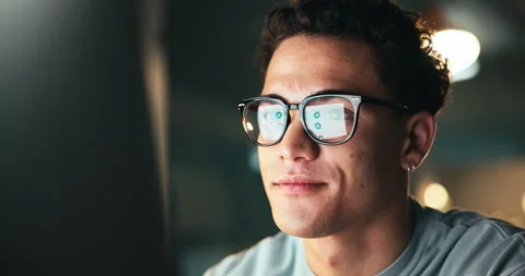 Serious, night and man with computer, reflection and testing of software for Video stock 301368559