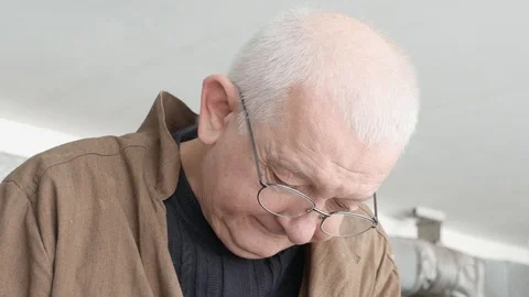 Serious old engineer in glasses at working. Portrait close up. Stock Footage 105839958