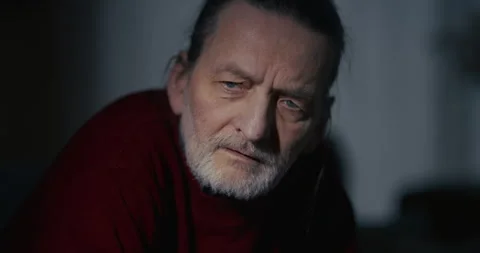 Serious older man portrait with dramatic side lighting Stock Footage 336276868