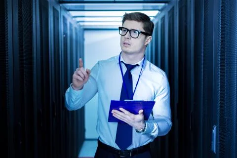 Serious operator pointing a finger Stock Photos