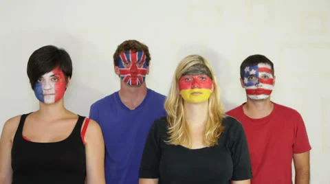 Serious people with flags on faces 库存影片 27500720