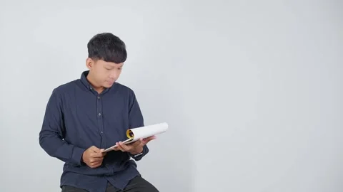 Serious Person Reading Document While Thinking Stock Footage 344831128