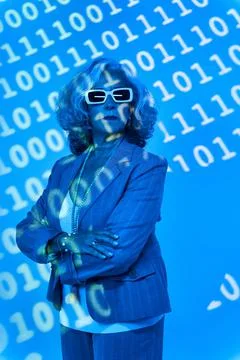 Serious senior programmer under binary code projection 스톡 사진