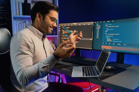 Serious smart IT developer meeting via application team record laptop. Surmise. Stock Photos
