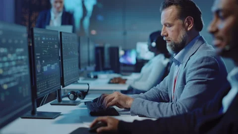 Serious Software Developer Working on Computer Stock Footage 135972154
