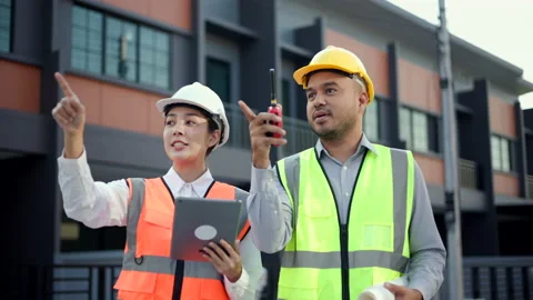  Serious two engineer man Using tablet for checking and maintenance. Stock Footage 224637740