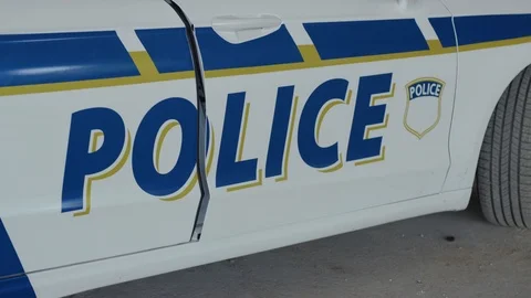 Serious two men cops come out of the patrol car stand near accepting emergence Stock Footage 112955335