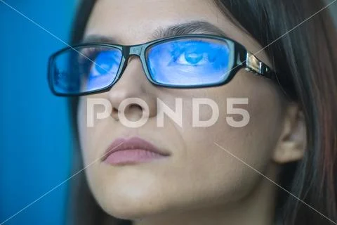 The serious woman in glasses Stock Photos