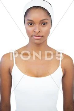 Serious woman wearing white headband Stock-Fotos