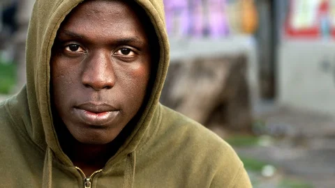 Serious young immigrant African staring at camera Stock-Footage 88547945