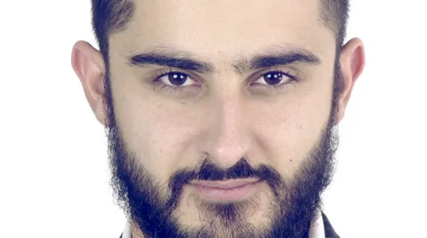 Serious young man with beard looking camera tracking shot Stock Footage 46736399