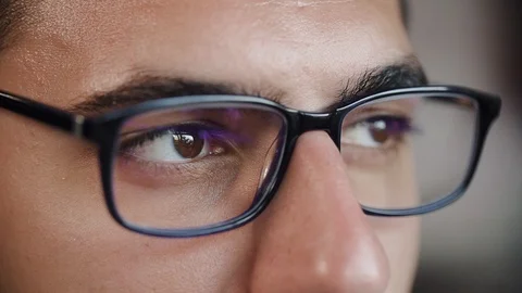 Serious young man at home looking at camera. Stock Footage 101850784