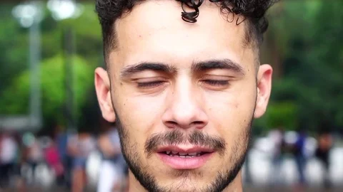 Serious Young Man Looking into the Camera Stock Footage 84078510