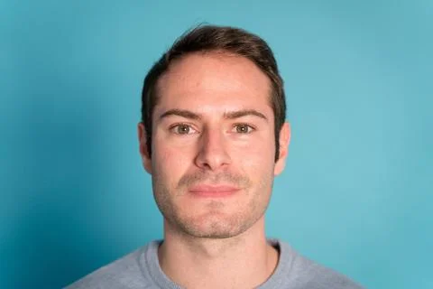 Serious young man looking at camera Stock Photos