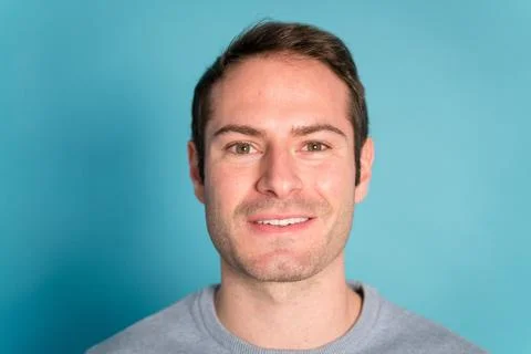 Serious young man looking at camera Stock Photos