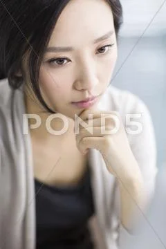 Serious young woman Stock Photos